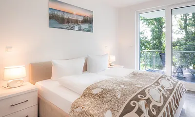 Schlafzimmer mit Doppelbett