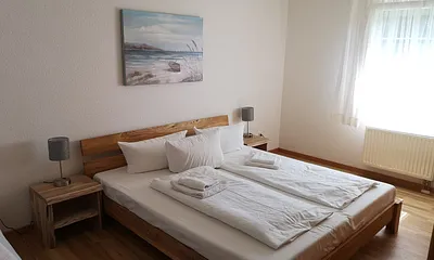 Schlafzimmer mit zusätzlichem Schlafsofa für 1 weitere Person