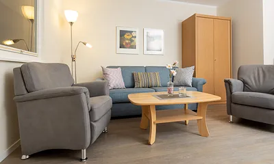 Wohnzimmer mit Schlafsofa