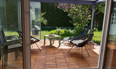 Wintergarten mit Holzfußboden