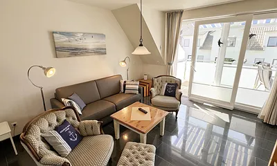 Wohnbereich mit Zugang zum Balkon