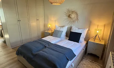 Schlafbereich mit Doppelbett 160 x 200 cm