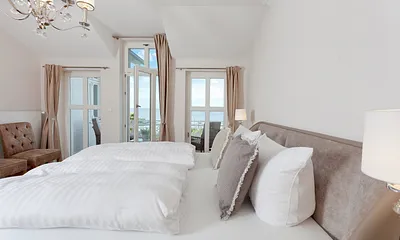 Schlafzimmer mit Balkon