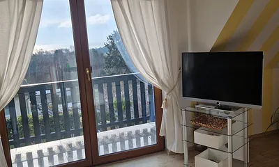 Wohnbereich mit kleinem Balkon