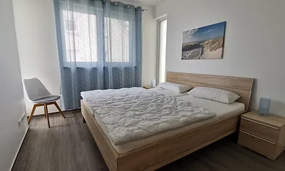 Schlafzimmer mit Doppelbett (voll verdunkelbar)