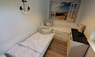 Schlafzimmer mit 2 Einzelbetten und TV