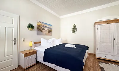 1. Schlafzimmer mit Doppelbett