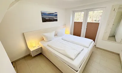 3.Schlafzimmer mit Doppelbett