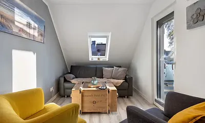 Wohnzimmer mit Schlafsofa 