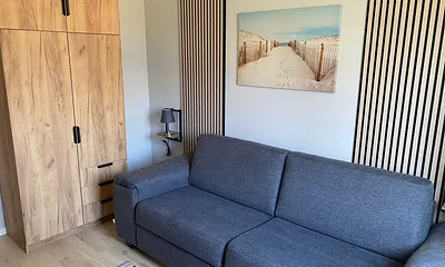 Schlafzimmer 2 mit ausklappbaren vollwertigen Sofa