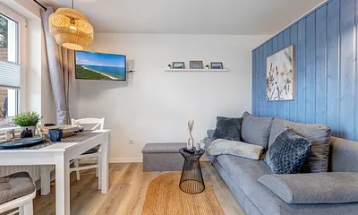 Ess- und Sitzbereich mit Flat-TV