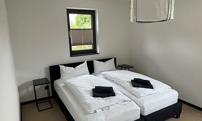 Schlafzimmer mit 2 Einzelbetten