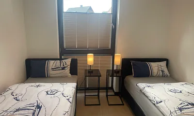 Schlafzimmer mit 2 Einzelbetten
