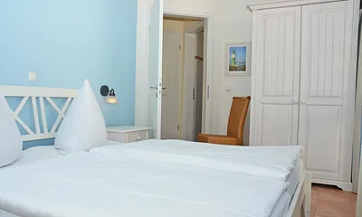 Schlafzimmer mit Doppelbett