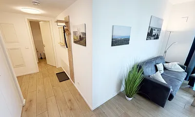 Villa Düne Whg. 19 Penthouse - Flur und Wohnzimmer