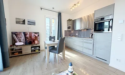 Villa Düne Whg. 19 Penthouse - Wohn- und Essbereich