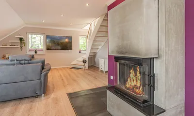 Wohnzimmer mit Kamin