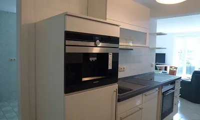 Küche mit div. neuen modernen Geräten 