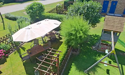 Gartenansicht aus dem Wohnzimmerfenster