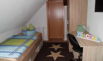 Kinderzimmer mit 2 Einzelbetten Fewo I 