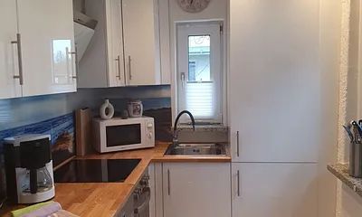 Küche mit Spülmaschine, Münzwaschmaschine,Herd , Mikrowelle, Kaffeemaschine ect.