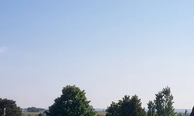 Blick auf das Achterwasser vom Balkon und der Wohnung