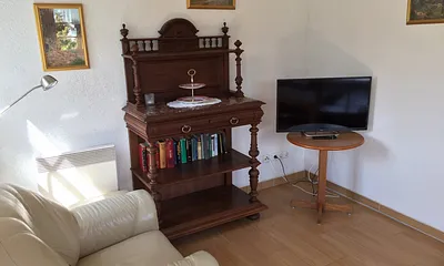 Gemütliche Wohnveranda mit TV