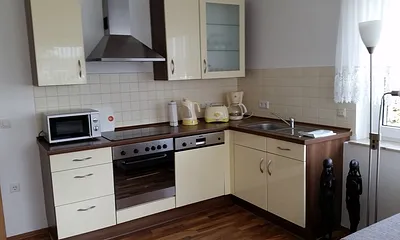 Wohnzimmer + offene Küche