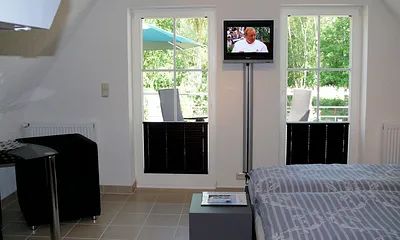 Blick vom Zimmer auf die Dachterrasse 