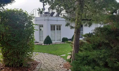 Blick auf Ihre Dachterrasse, vom Garten aus betrachtet