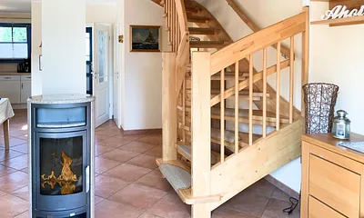 Kaminofen und Treppe ins OG