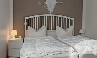 Schlafzimmer mit KingsizeBett (180x200cm) 