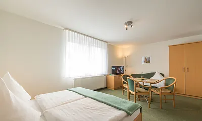 Blickwinkel vom Schlafbereich zum Wohnbereich