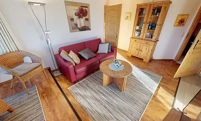 Wohnzimmer mit der variablen Ausziehcouch