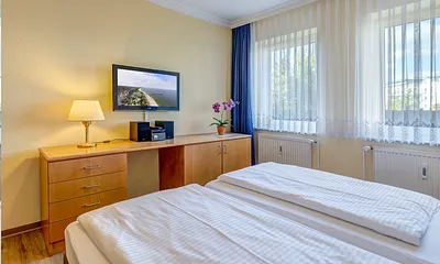 Schlafzimmer mit Flat-TV