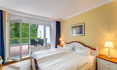 Schlafzimmer mit Zugang auf die Dachterrasse