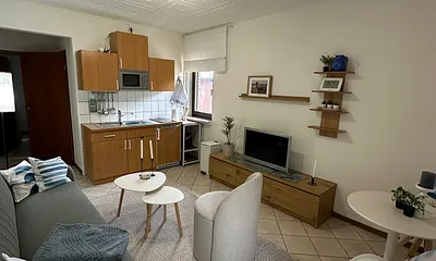 Wohnzimmer mit Pantryküche