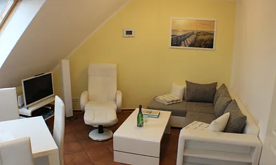 Wohnzimmer mit Küche