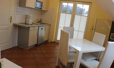 Wohnzimmer mit Küche