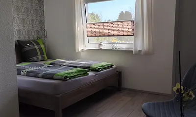 Schlafzimmer mit Doppelbett
