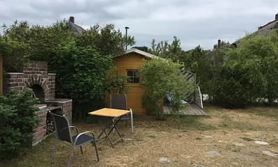 Griilplatz auf dem Grundstück mit Sauna