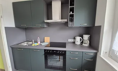 Küche (u.a. mit Geschirrspüler und Backofen)