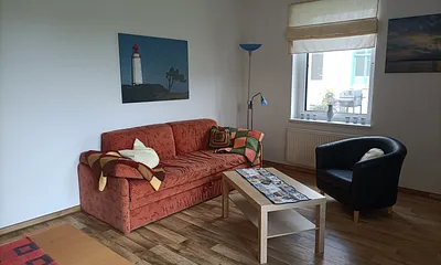 Wohnzimmer mit Ausziehcouch