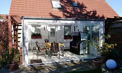 Wintergarten/Terrasse m. Grillmöglichk. u. Eingang z. FW 