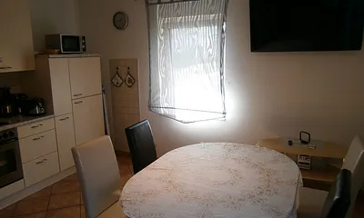 Küche/ Essbereich/ TV