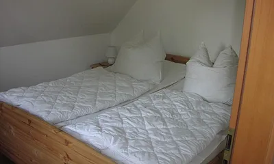 Doppelbett im Schlafzimmer