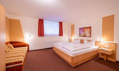 Schlafzimmer mit zusätzlichem Schlafplatz