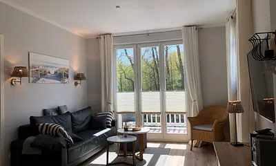 Wohnbereich zur Sonnenseite mit Blick in den Stadtwald