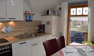 Von der Küche geht es auf den Balkon