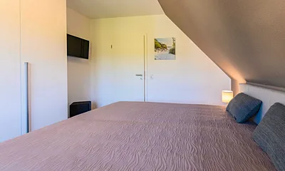 zweites Schlafzimmer mit TV
